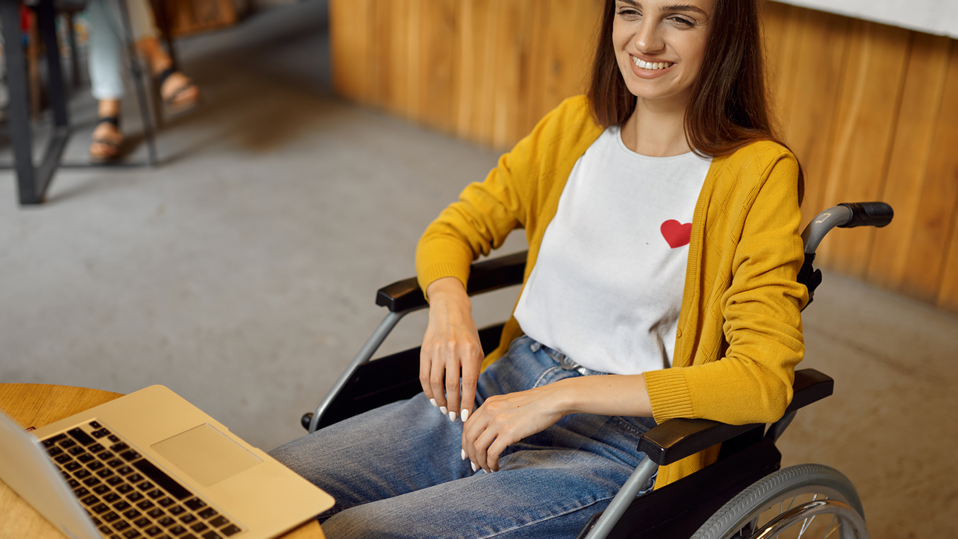 t-shirt-mockup-of-a-woman-using-a-wheelchair-and-working-m18485-r-el2